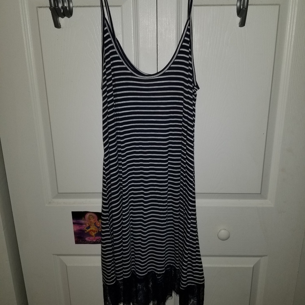 Tank top dress mid length.